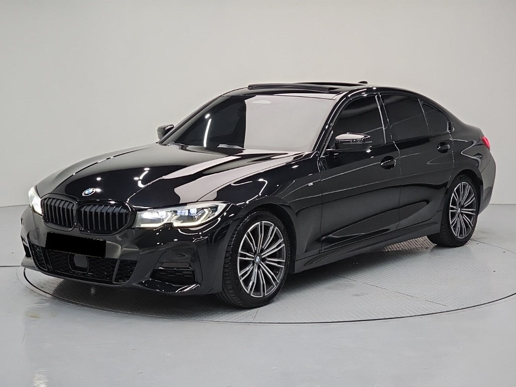 BMW 3-Series — photo 01