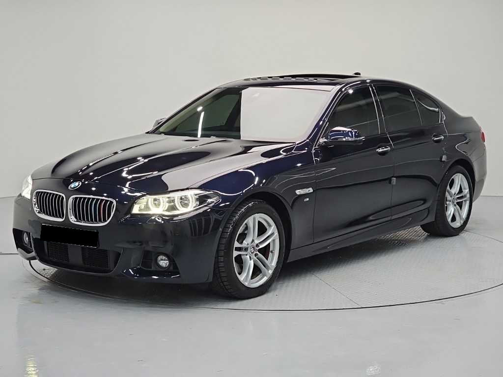 BMW 5-Series — photo 01