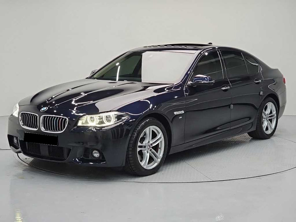 BMW 5-Series — photo 01