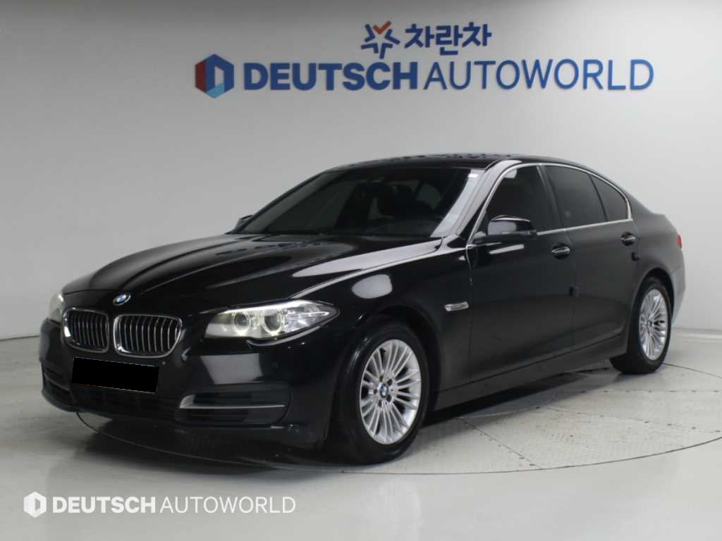 BMW 5-Series — photo 01