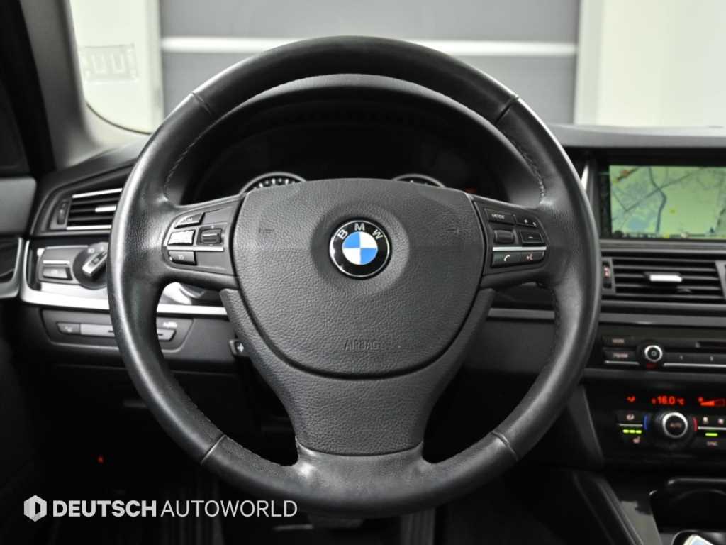 BMW 5-Series — photo 13