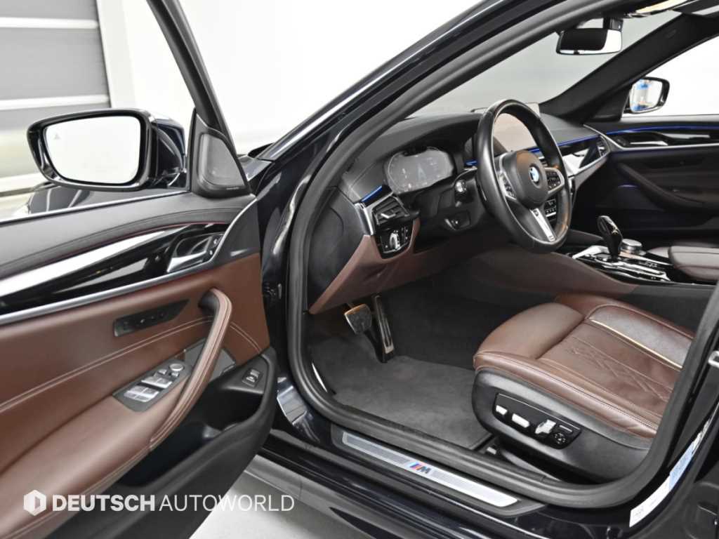 BMW 5-Series — photo 11