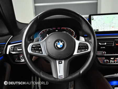 BMW 5-Series — photo 13