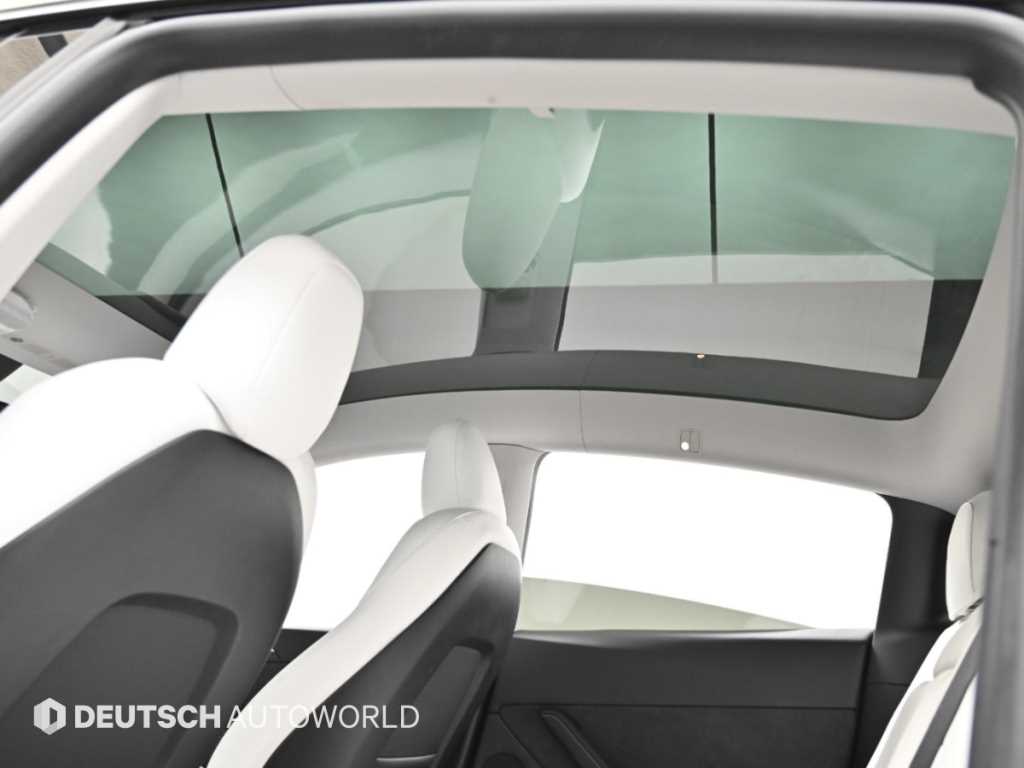 Tesla Model Y — photo 18