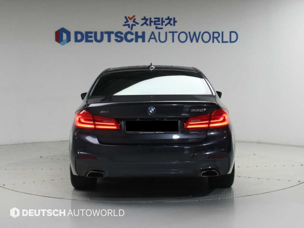 BMW 5-Series — photo 04