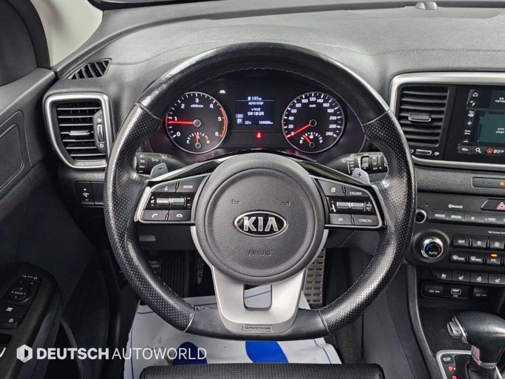 Kia Sportage — photo 13
