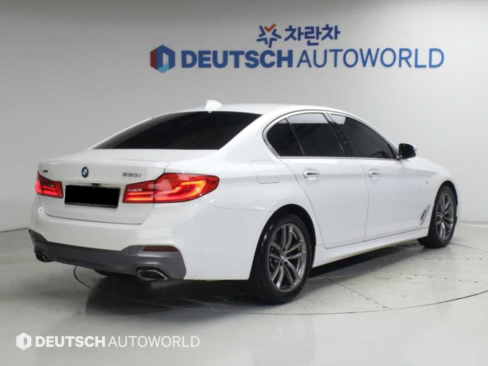 BMW 5-Series — photo 02