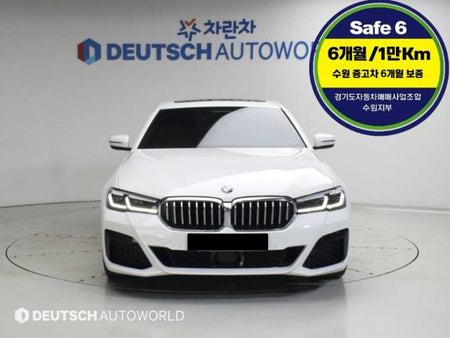 BMW 5-Series — photo 01