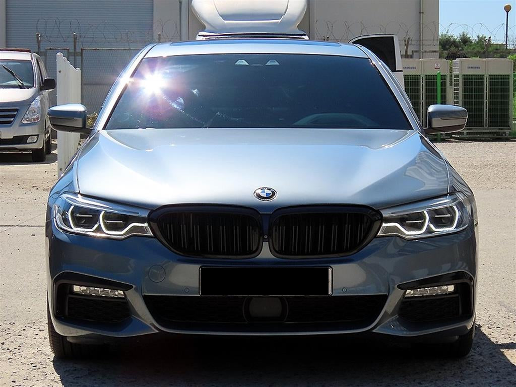 BMW 5-Series — photo 01
