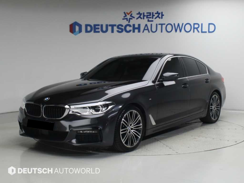 BMW 5-Series — photo 01