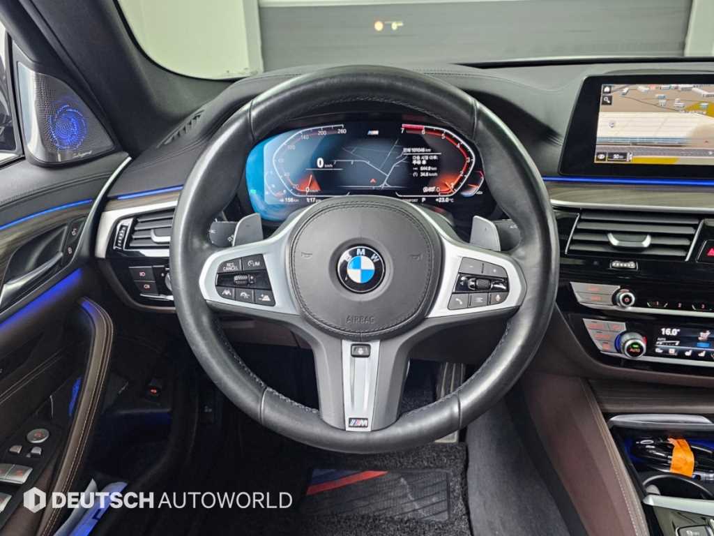 BMW 5-Series — photo 13