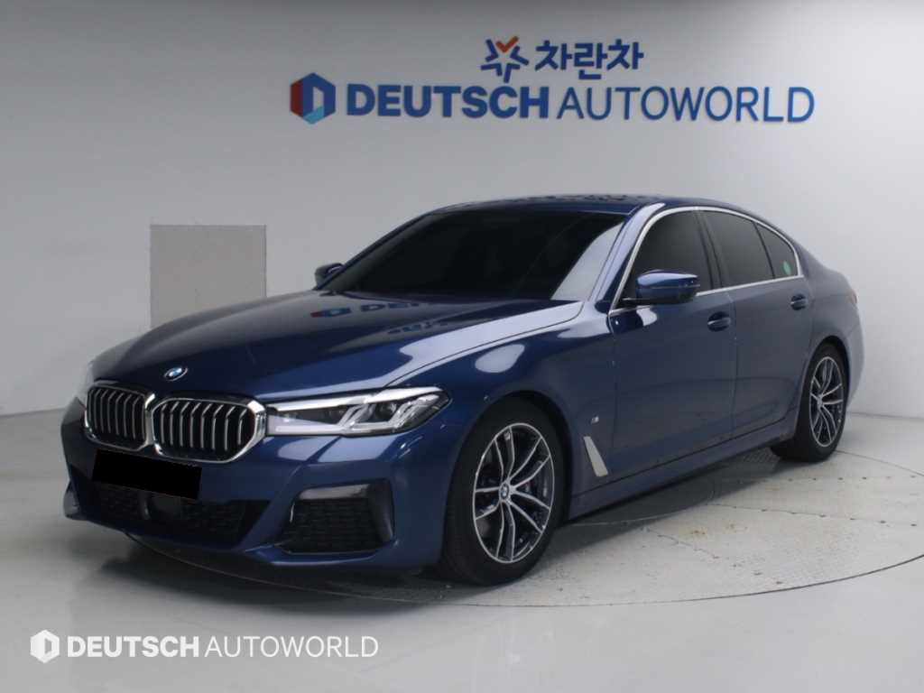 BMW 5-Series — photo 01