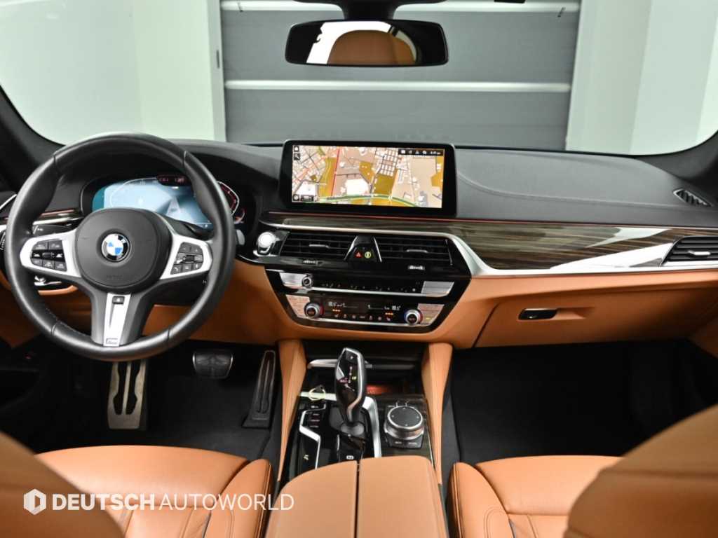 BMW 5-Series — photo 07