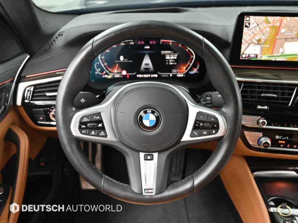 BMW 5-Series — photo 13