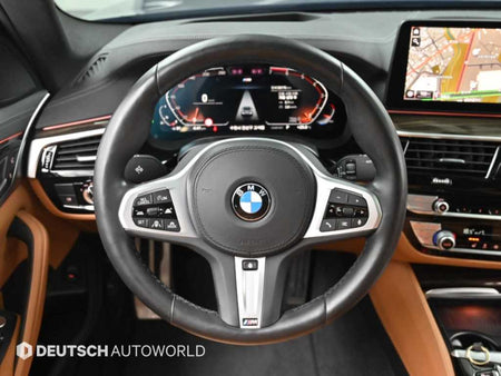BMW 5-Series — photo 13
