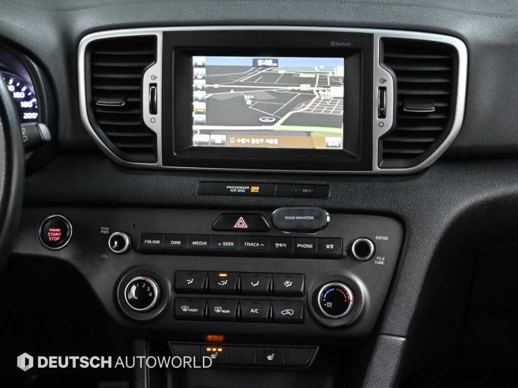 Kia Sportage — photo 14