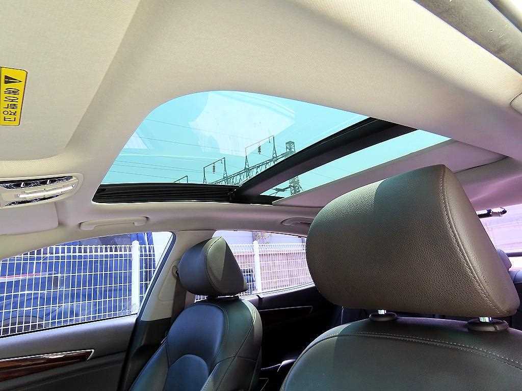 Kia K7 — photo 17
