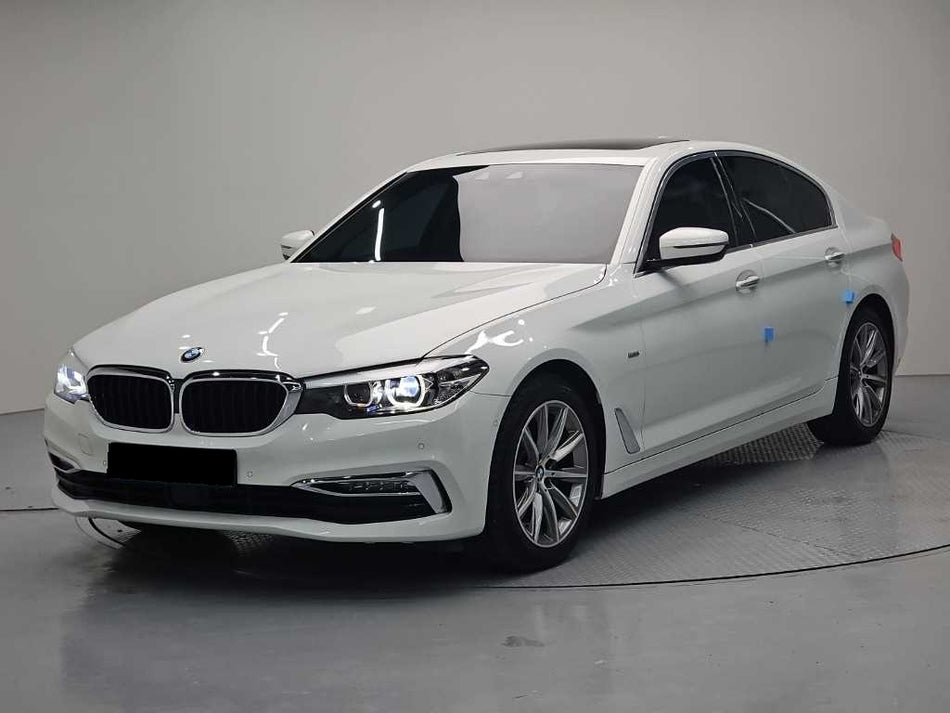 BMW 5-Series — photo 01