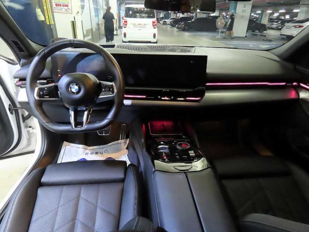 BMW 5-Series — photo 10