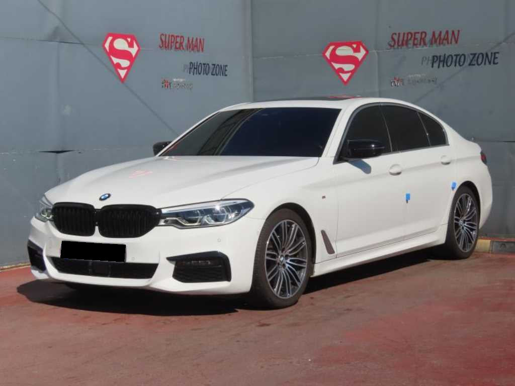 BMW 5-Series — photo 01