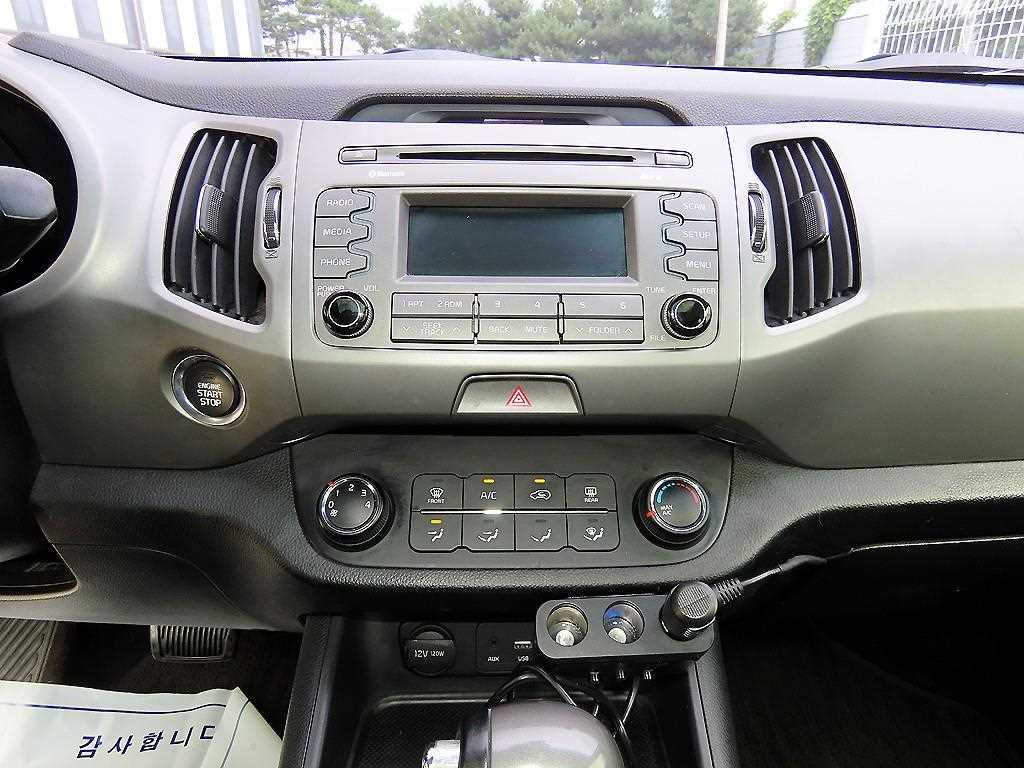 Kia Sportage — photo 14