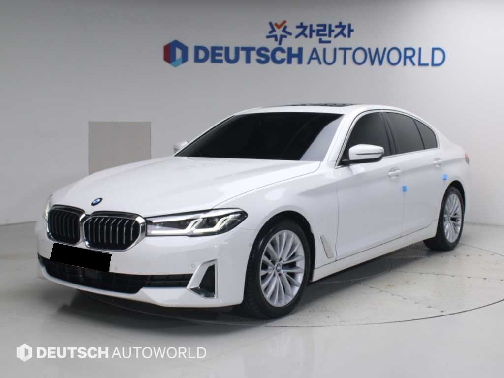 BMW 5-Series — photo 01