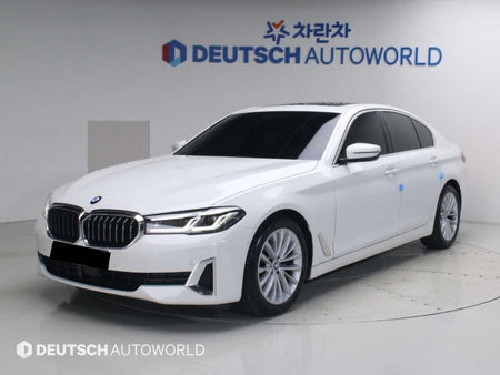 BMW 5-Series — photo 01