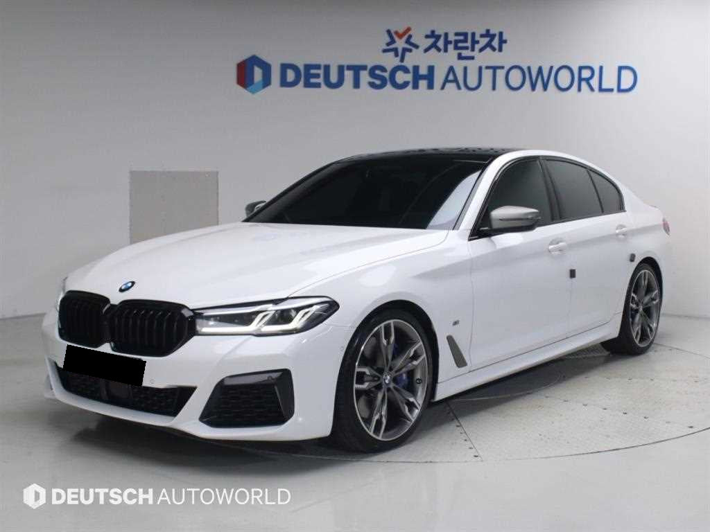 BMW 5-Series — photo 01