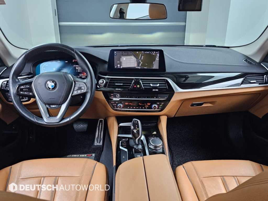 BMW 5-Series — photo 01