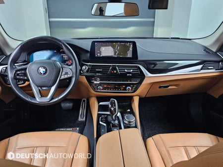 BMW 5-Series — photo 01