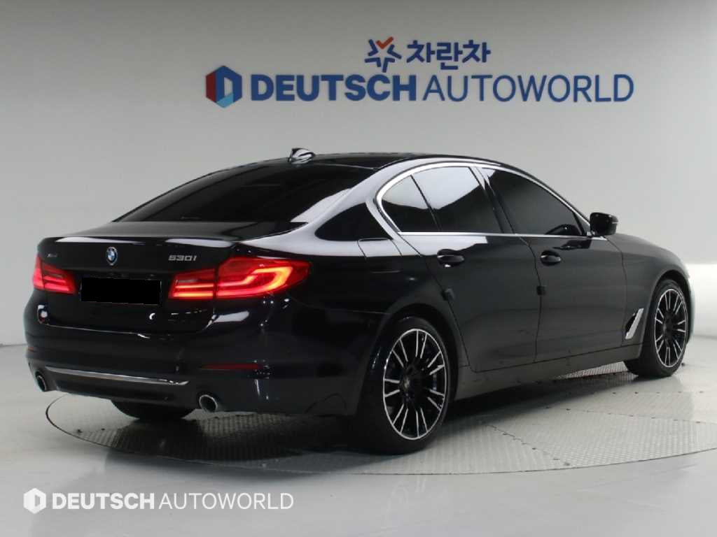BMW 5-Series — photo 02