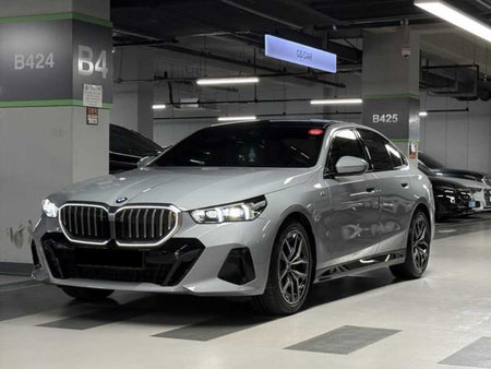 BMW 5-Series — photo 01