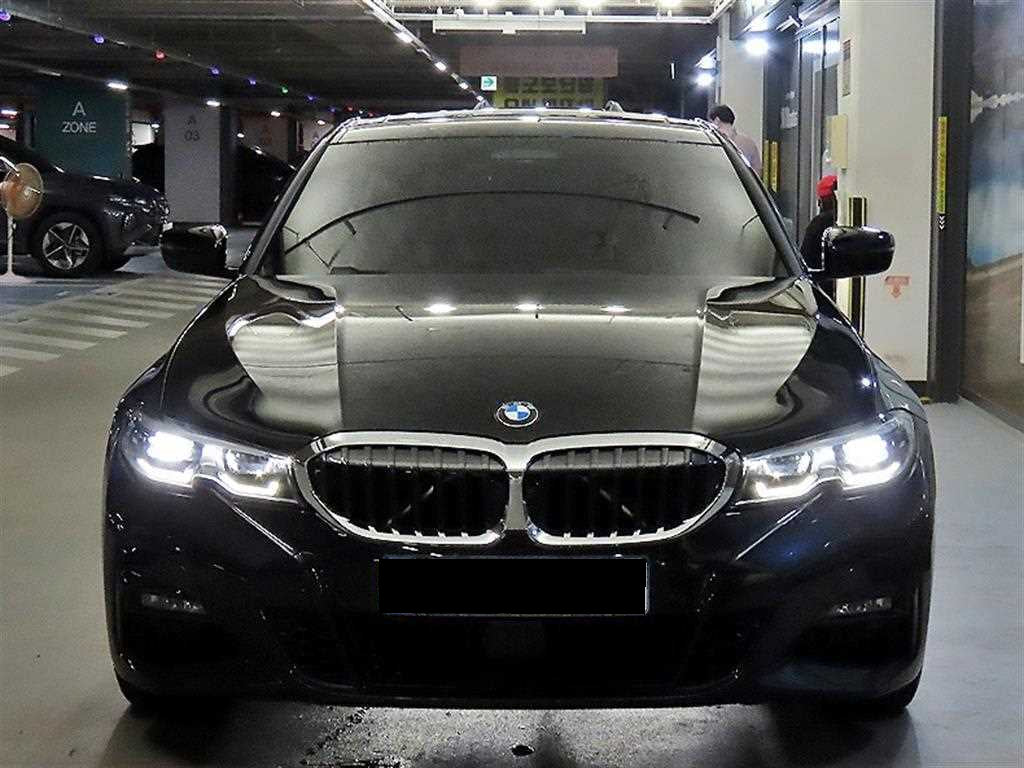 BMW 3-Series — photo 01