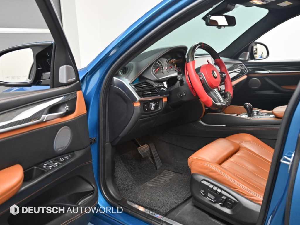 BMW X6M — photo 11