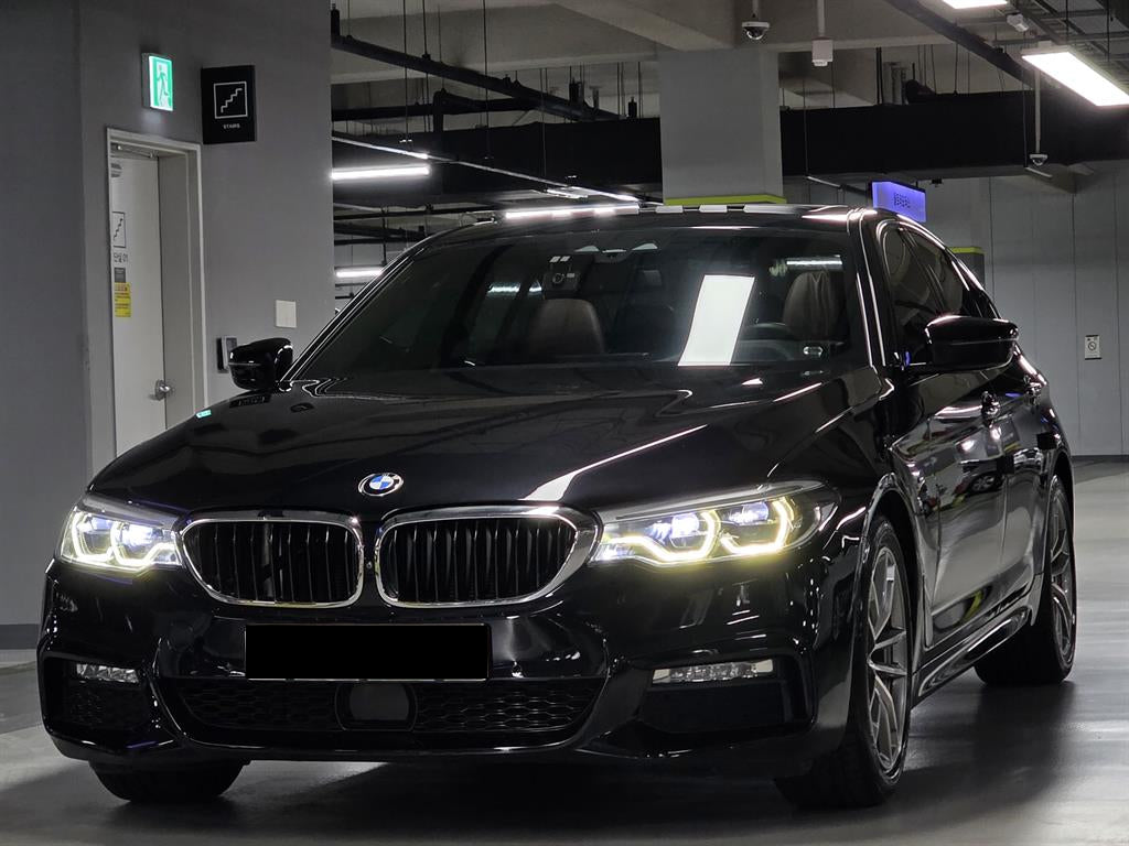 BMW 5-Series — photo 01