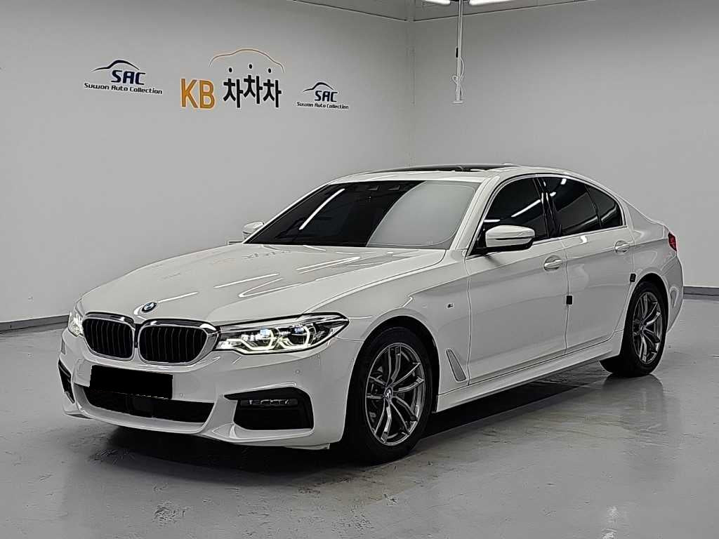 BMW 5-Series — photo 01
