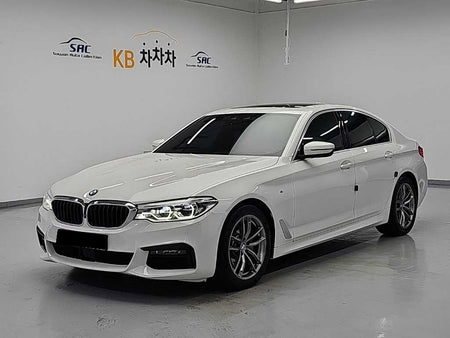 BMW 5-Series — photo 01