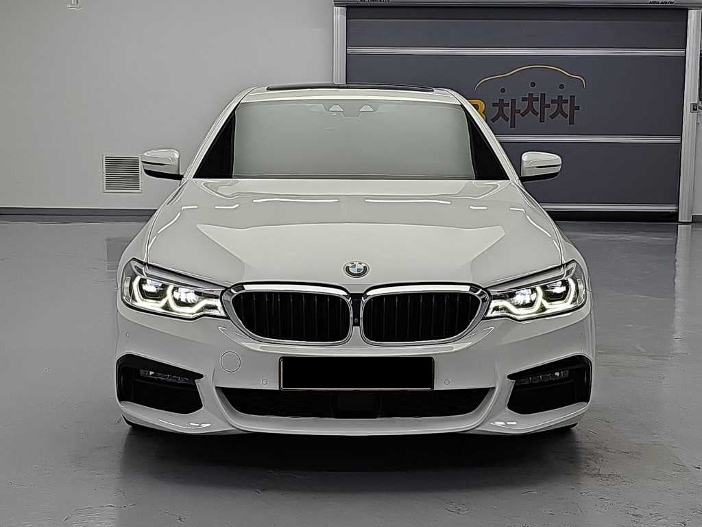 BMW 5-Series — photo 02