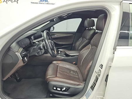 BMW 5-Series — photo 11