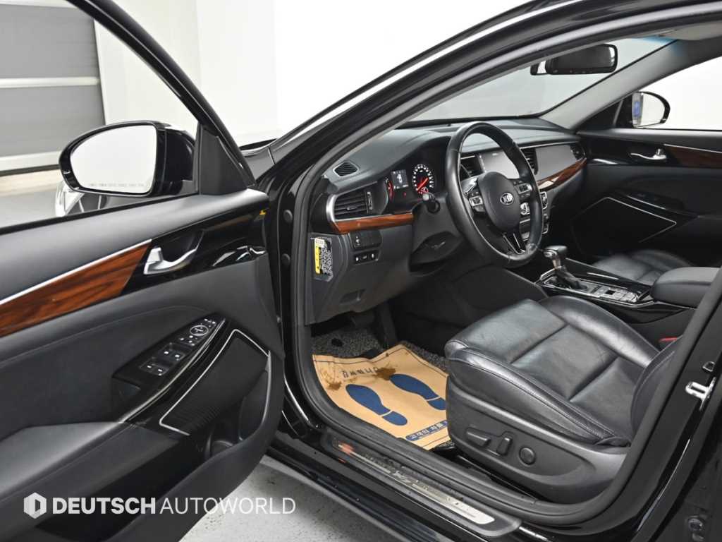 Kia K7 — photo 11