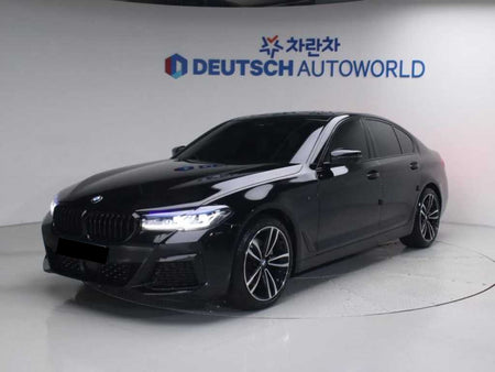 BMW 5-Series — photo 01