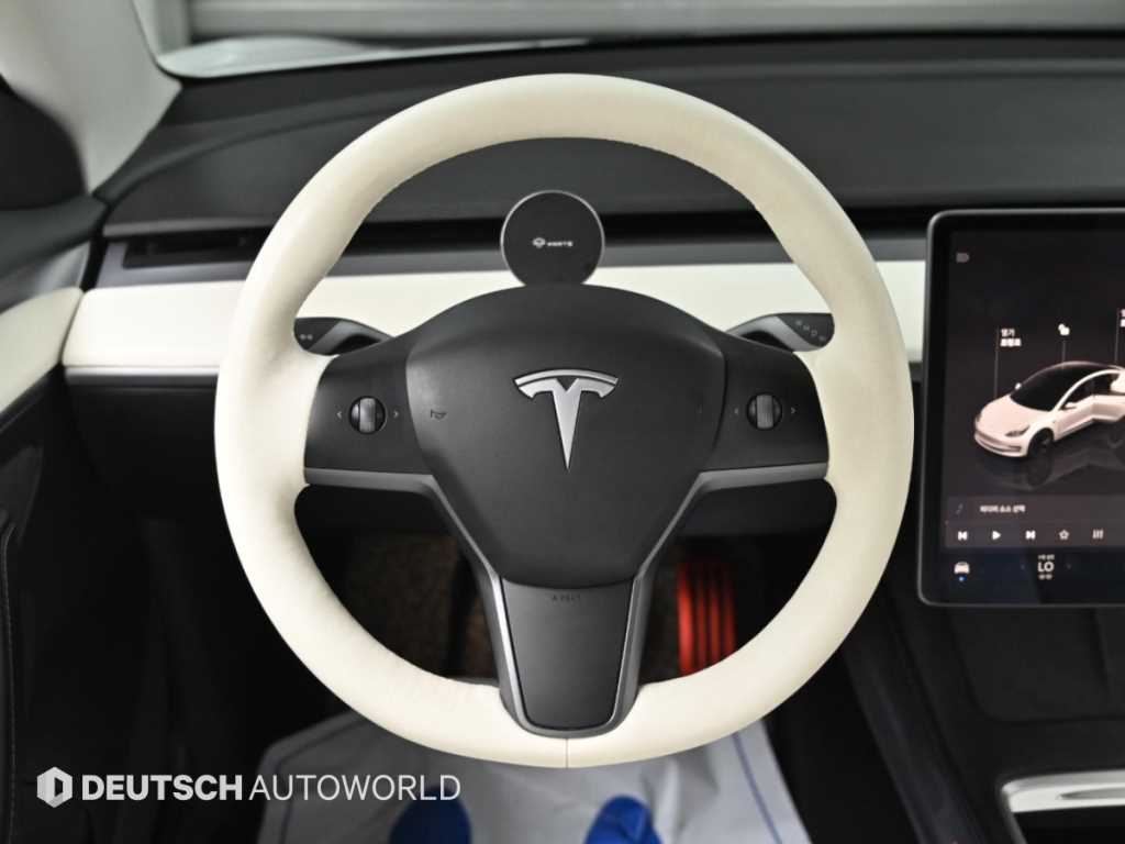 Tesla Model 3 — photo 13