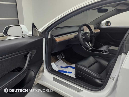 Tesla Model 3 — photo 11