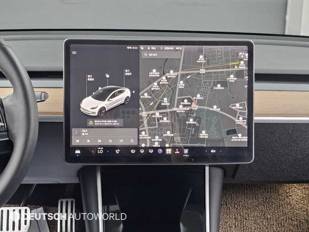 Tesla Model 3 — photo 14