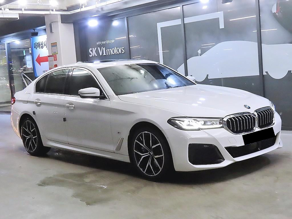 BMW 5-Series — photo 01