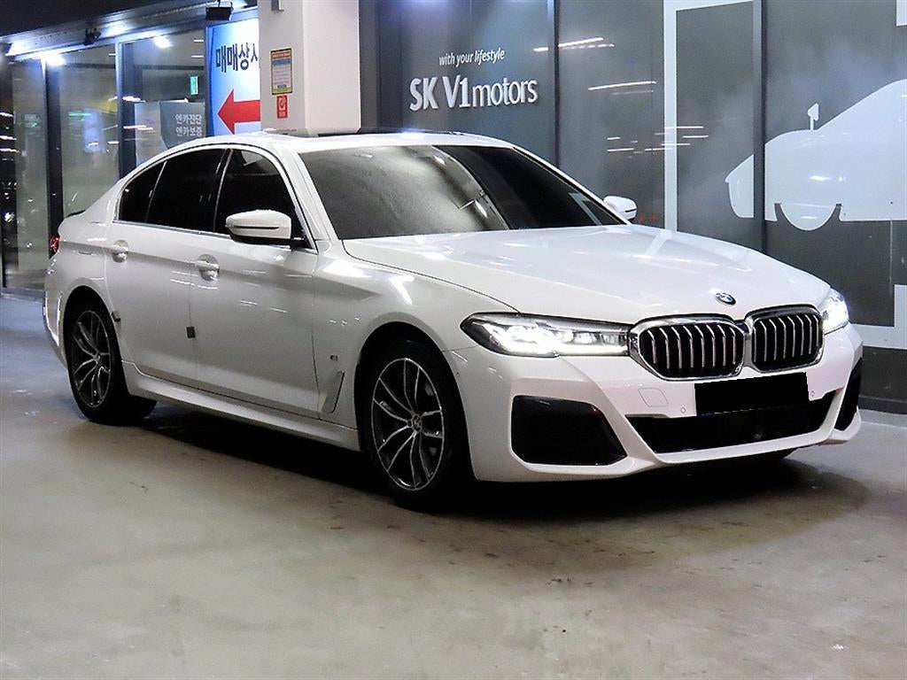 BMW 5-Series — photo 01