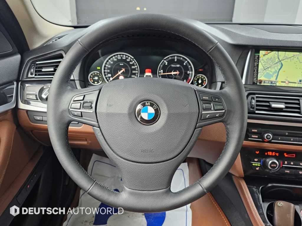 BMW 5-Series — photo 13