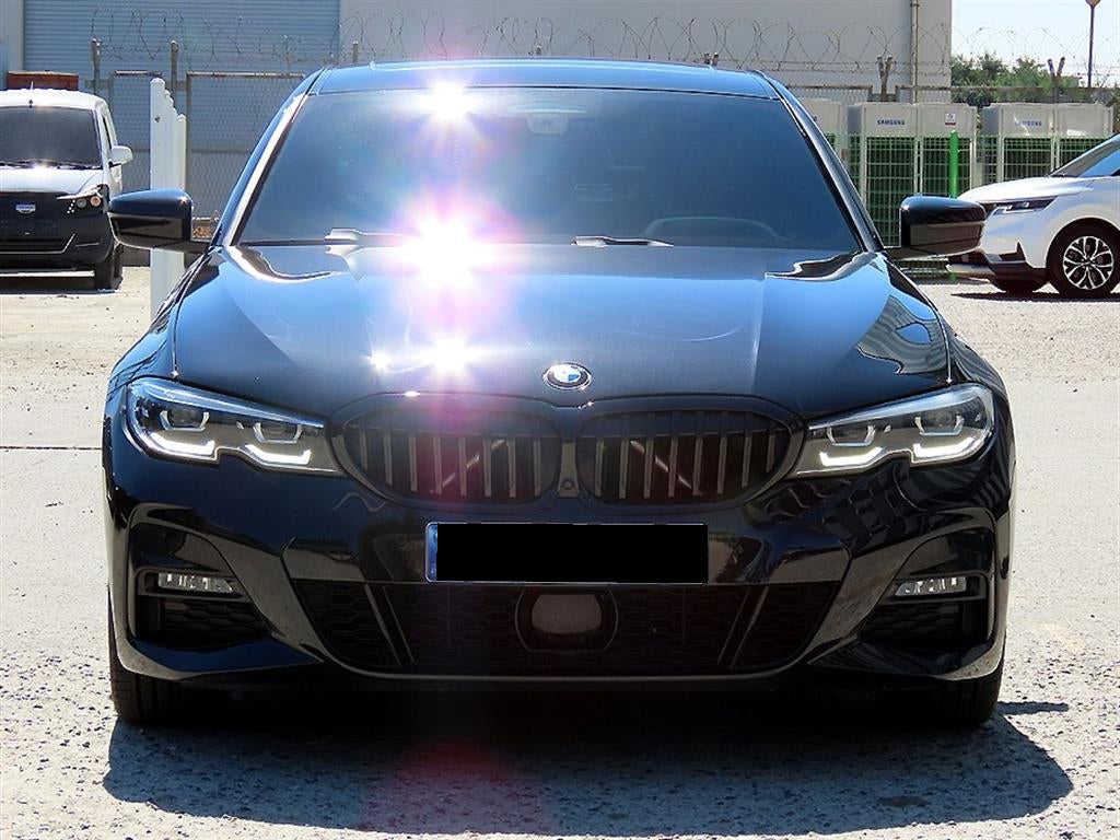 BMW 3-Series — photo 01