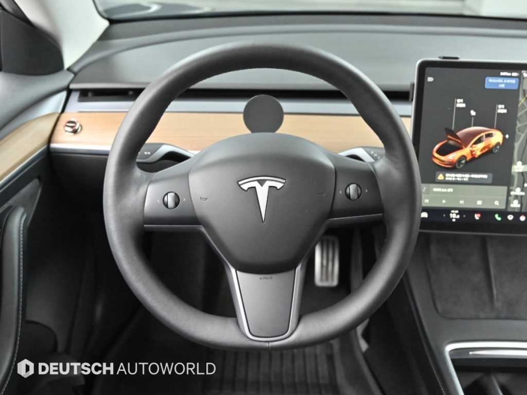Tesla Model 3 — photo 13