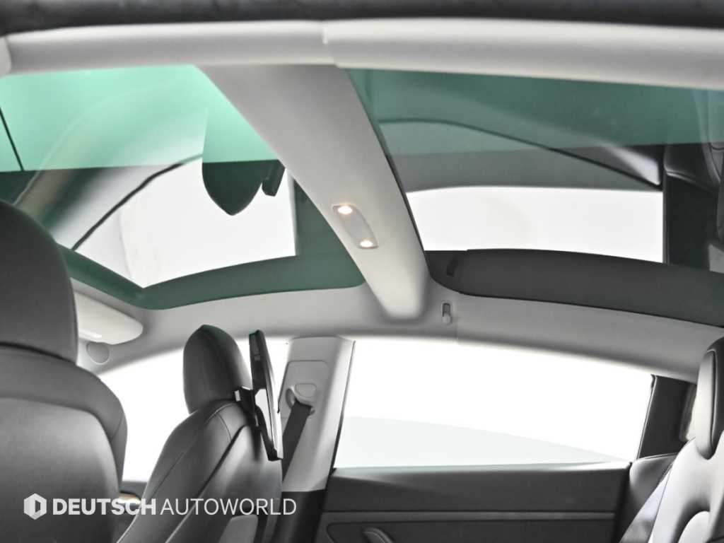Tesla Model 3 — photo 18